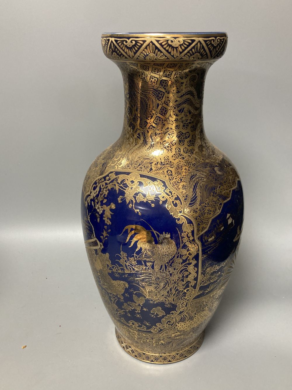 A Japanese satsuma vase, a tea cup and saucer and another vase, tallest 37cm